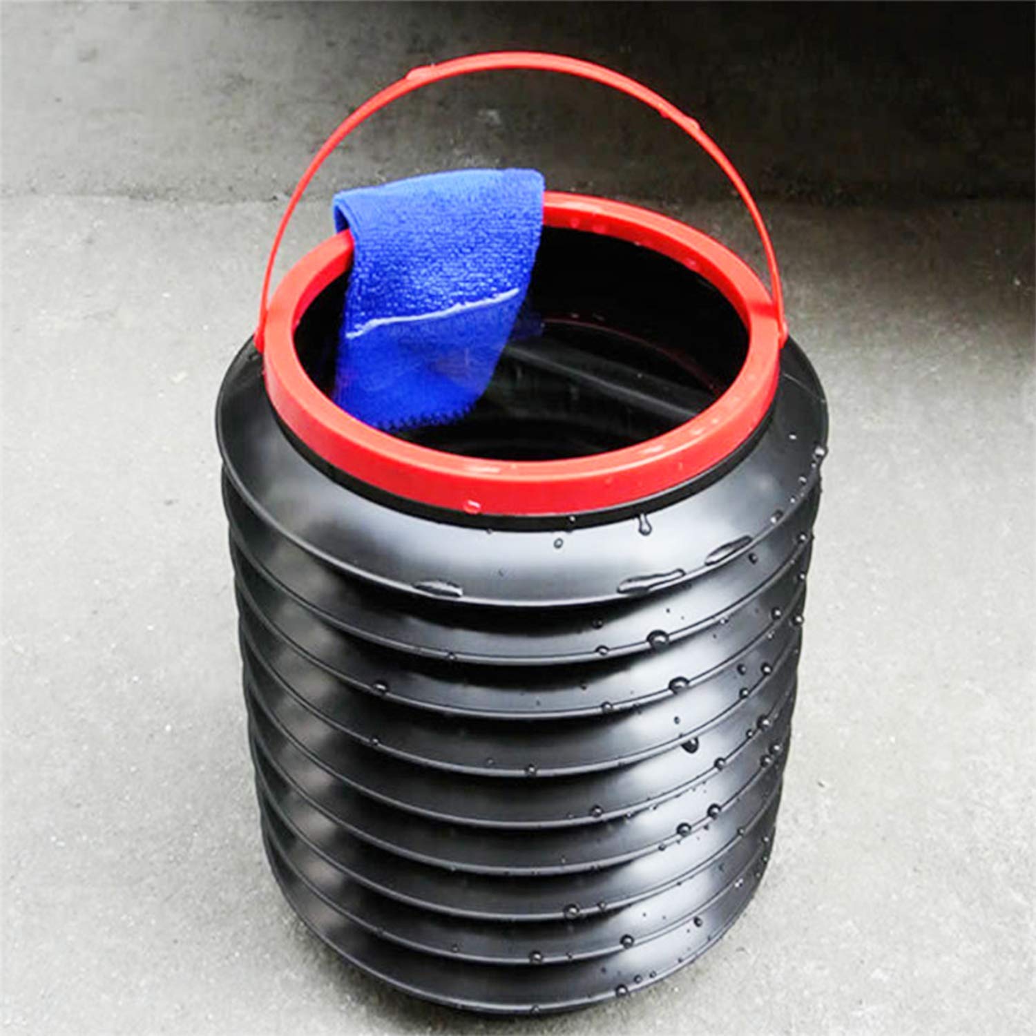 Top view of foldable bucket demonstrating its compact and expandable design. Top view of foldable bucket demonstrating its compact and expandable design.